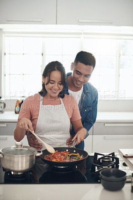 Buy stock photo Help, cooking and couple in kitchen together with healthy food, relationship and bonding in home. Diet, hungry man and happy woman in apartment with nutrition, care and meal prep for lunch with love