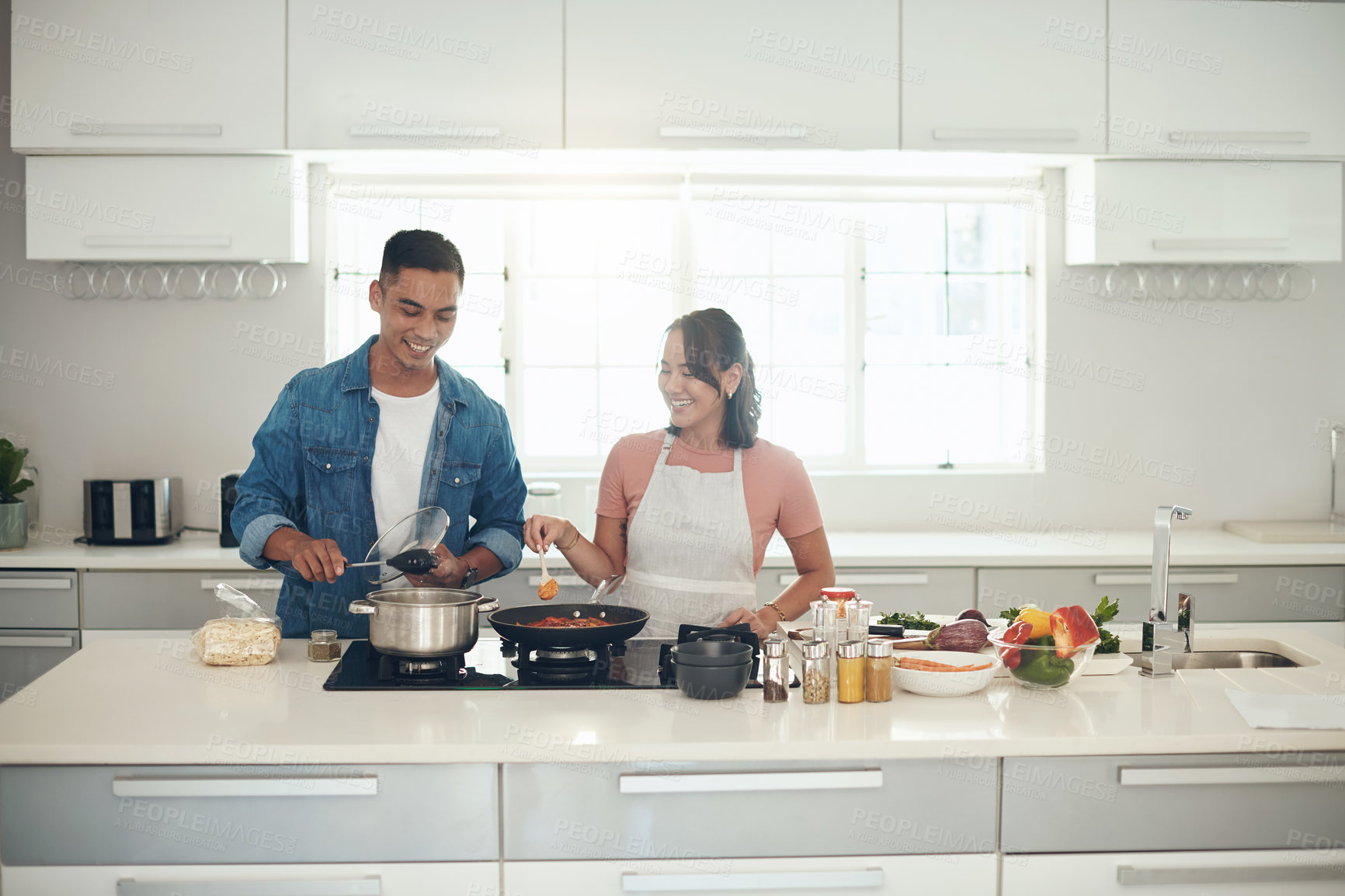 Buy stock photo Lunch, cooking and couple at kitchen counter together with healthy food, relationship and bonding in home. Help, happy man and woman in apartment with nutrition, smile and diet meal prep with love