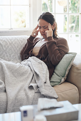 Buy stock photo Sick woman, tissue and headache with flu, sinus or pain from illness on living room sofa at home. Young female person with migraine from high fever, influenza or infection on lounge couch at house