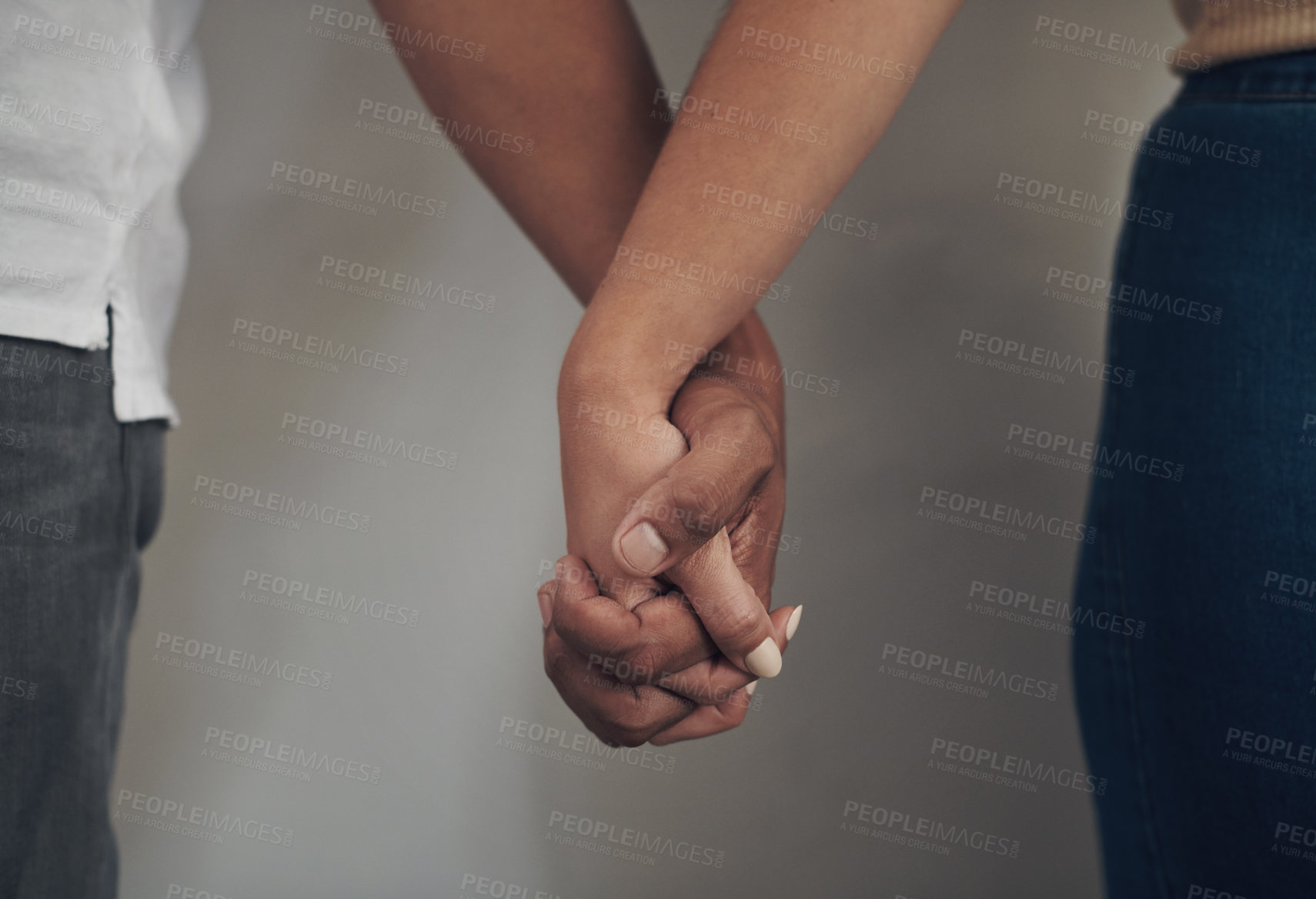 Buy stock photo Couple, love and holding hands for support, care and solidarity or romance with studio background. Compassion, partnership or relationship for people, marriage or hope or trust for affection together