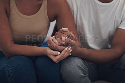 Buy stock photo Couple, love and holding hands for trust, care and solidarity or romance with respect. Compassion, partnership and support for bad news in relationship, grief and marriage therapy for hope and unity