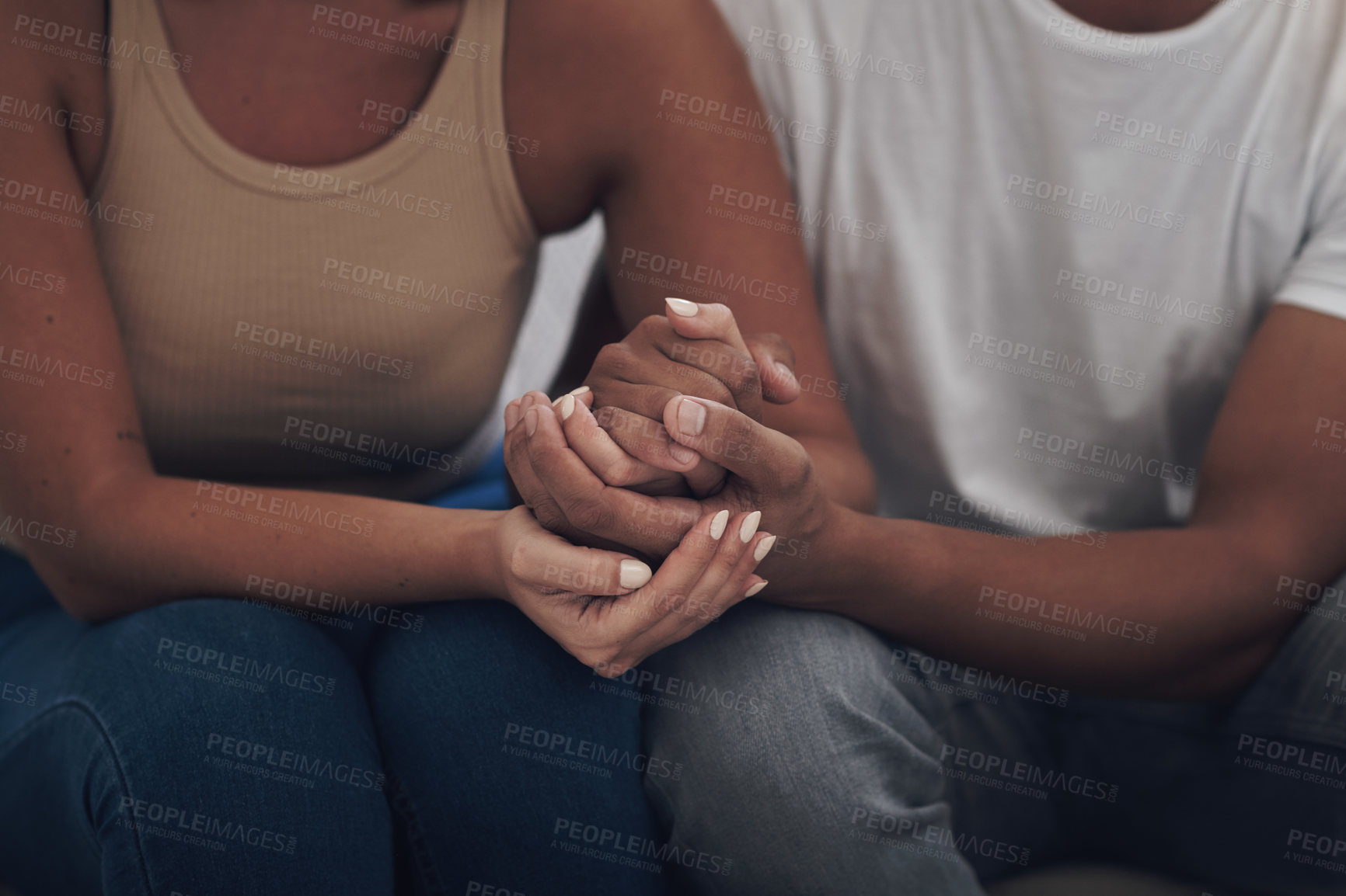 Buy stock photo Couple, love and holding hands for trust, care and solidarity or romance with respect. Compassion, partnership and support for bad news in relationship, grief and marriage therapy for hope and unity