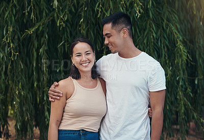 Buy stock photo Couple, nature and portrait for love on holiday with support, care or smile in marriage or outdoor vacation. Man, woman and hug together in park to travel on adventure, date or honeymoon in Indonesia