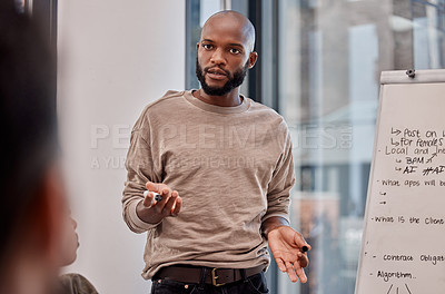 Buy stock photo Black man, coach and meeting with flipchart for teaching, presentation or creative learning at office. African male person or presenter explaining work for team discussion, staff training or startup