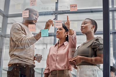 Buy stock photo Creative people, coach and planning with team on glass board for notes, tasks or mindmap at office. Group of employees brainstorming ideas for collaboration, project or agenda in startup at workplace