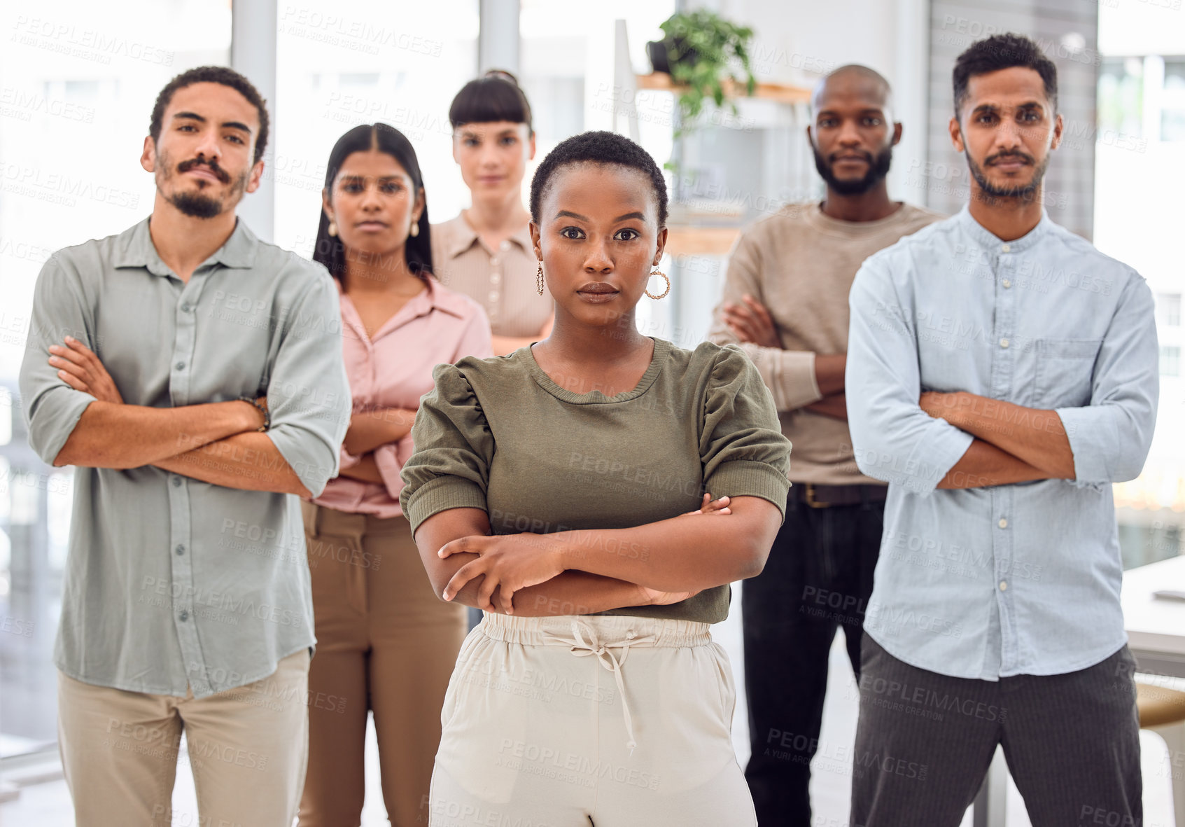 Buy stock photo Portrait, serious and creative team in office building of designer company, diversity and confident. People or group of management for agency with arms crossed for collaboration and professional.