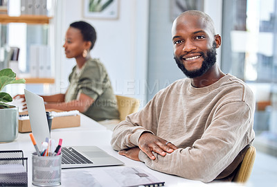 Buy stock photo Portrait of a businessman smiling while sitting at his desk