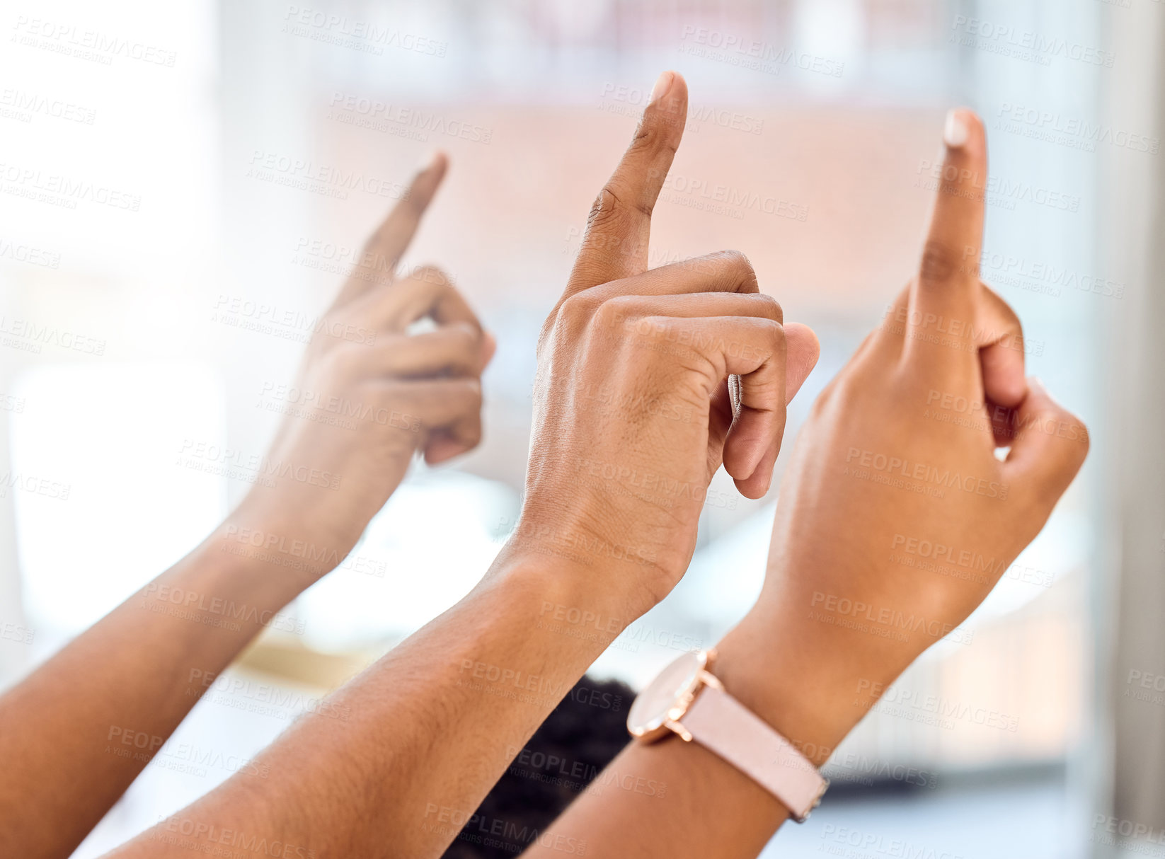 Buy stock photo Cropped shot of a group of people raising their hands during a presentation