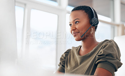 Buy stock photo Shot of a woman wearing a headset while working in a call centre