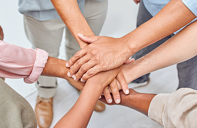 Buy stock photo Closeup shot of a group of unrecognizable people joining their hands together in unity
