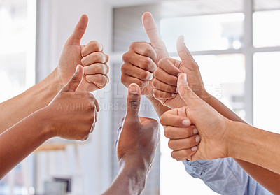 Buy stock photo Cropped shot of a group of unrecognizable people showing thumbs up in an office