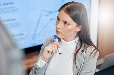 Buy stock photo Shot of a businesswoman deep in thought in a boardroom