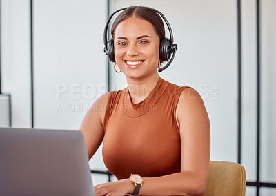 Buy stock photo Cropped portrait of an attractive young female call center agent working on her laptop