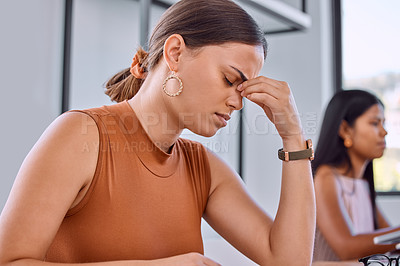 Buy stock photo Shot of a young businesswoman in pain in an office