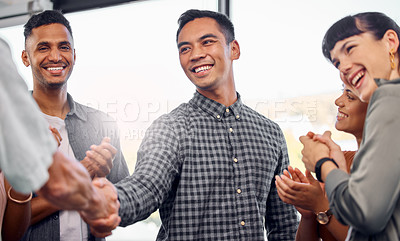 Buy stock photo Shot of businesspeople shaking hands  at the office