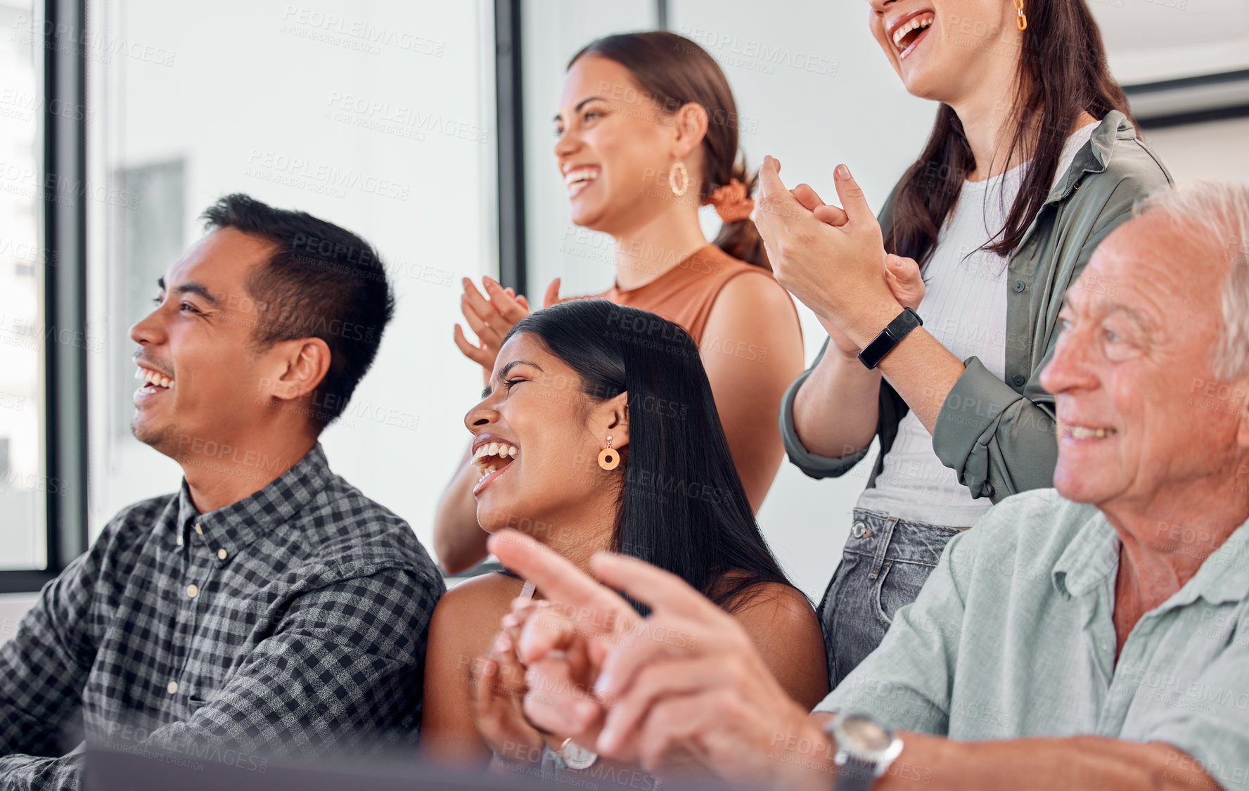 Buy stock photo Shot of a group of businesspeople clapping during a meeting at the office