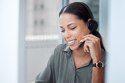 Buy stock photo Shot of a young businesswoman working in a call centre