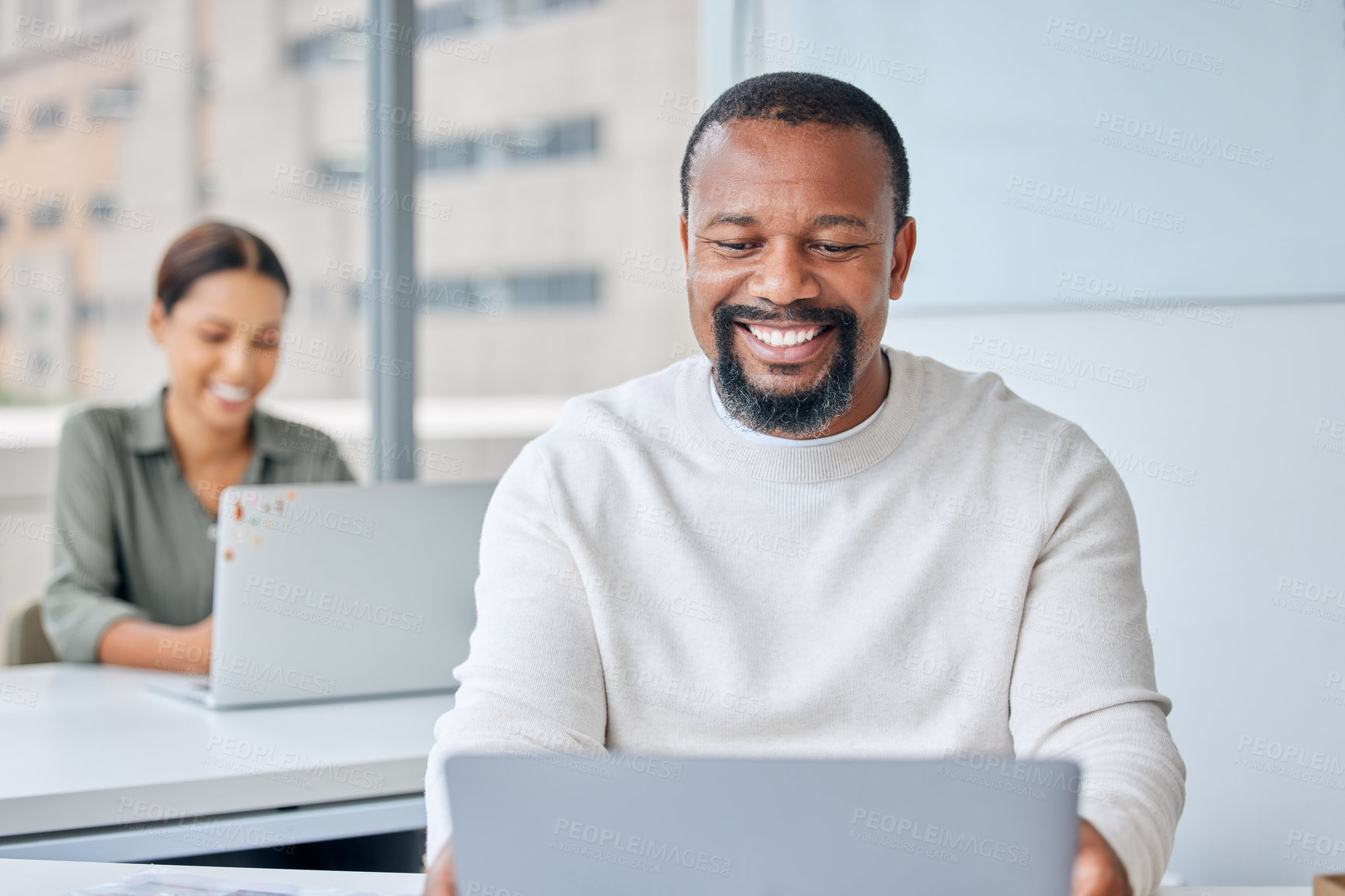 Buy stock photo Creative, office and black man with laptop coworking, writing and research online with productivity on project. Happy, businessman and journalist with hard work, typing article and review news