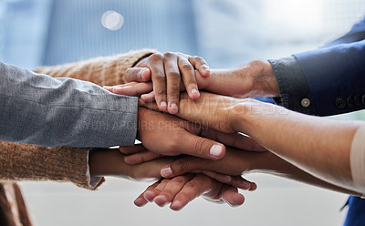 Buy stock photo Shot of a group of people with their hands stacked