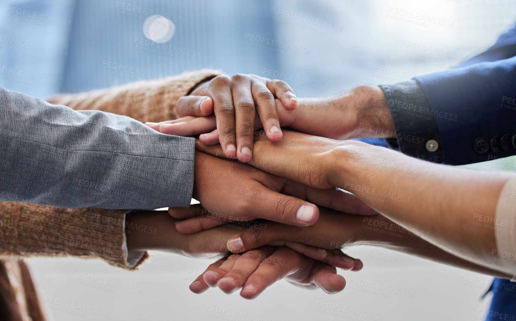 Buy stock photo Shot of a group of people with their hands stacked