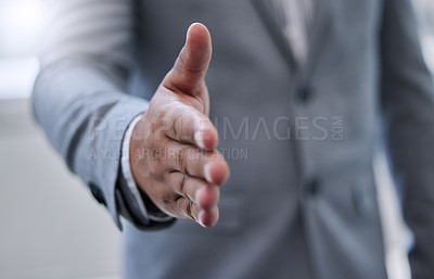Buy stock photo Shot of a businessman holding out his hand for a handshake