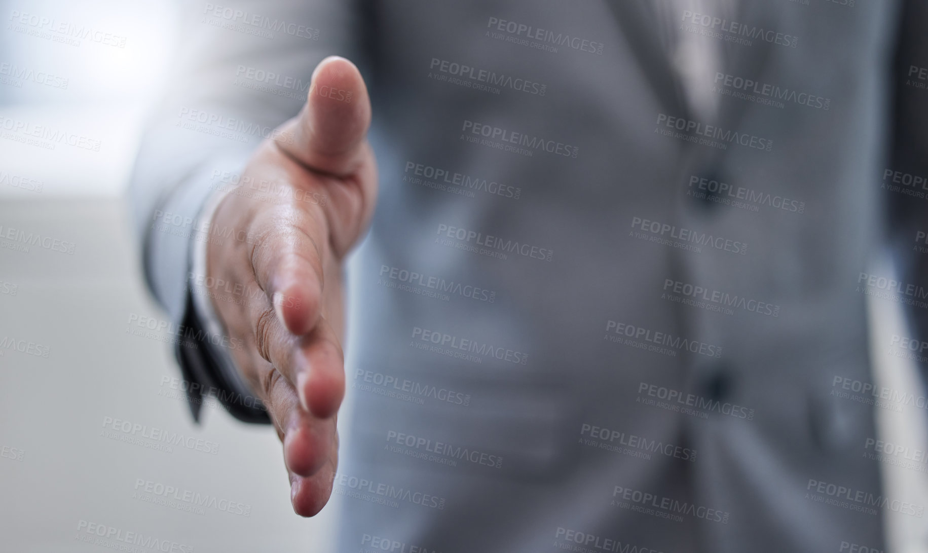 Buy stock photo Shot of a businessman holding out his hand for a handshake