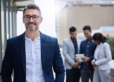 Buy stock photo Happy, mature businessman and leader with team for confidence in employees outdoors in urban city. Smile, male person or ceo with glasses for pride, ambition and trust in staff for company startup