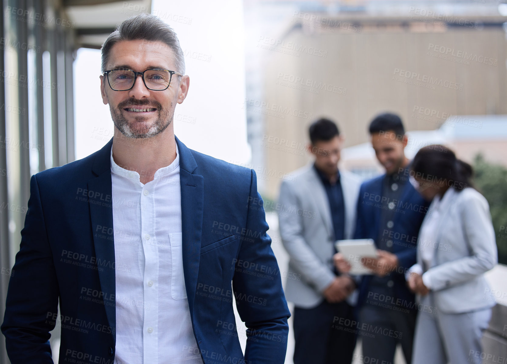 Buy stock photo Happy, mature businessman and leader with team for confidence in employees outdoors in urban city. Smile, male person or ceo with glasses for pride, ambition and trust in staff for company startup