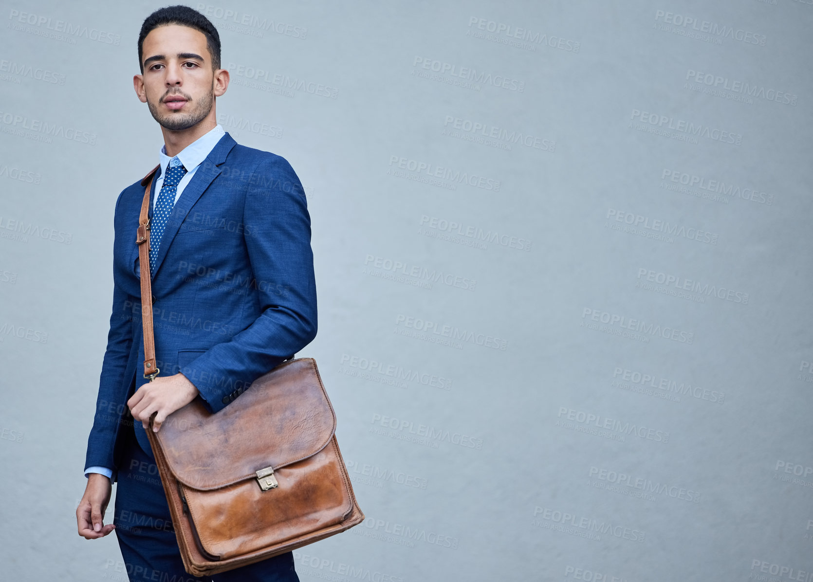 Buy stock photo Thinking, business and man with bag, professional and corporate intern on grey studio background. Person, employee or consultant with satchel, mockup space and ideas with solution, choice or decision