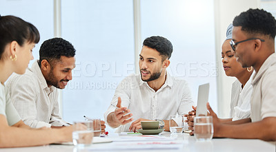 Buy stock photo Cropped shot of a group of young diverse businesspeople having a meeting in the boardroom