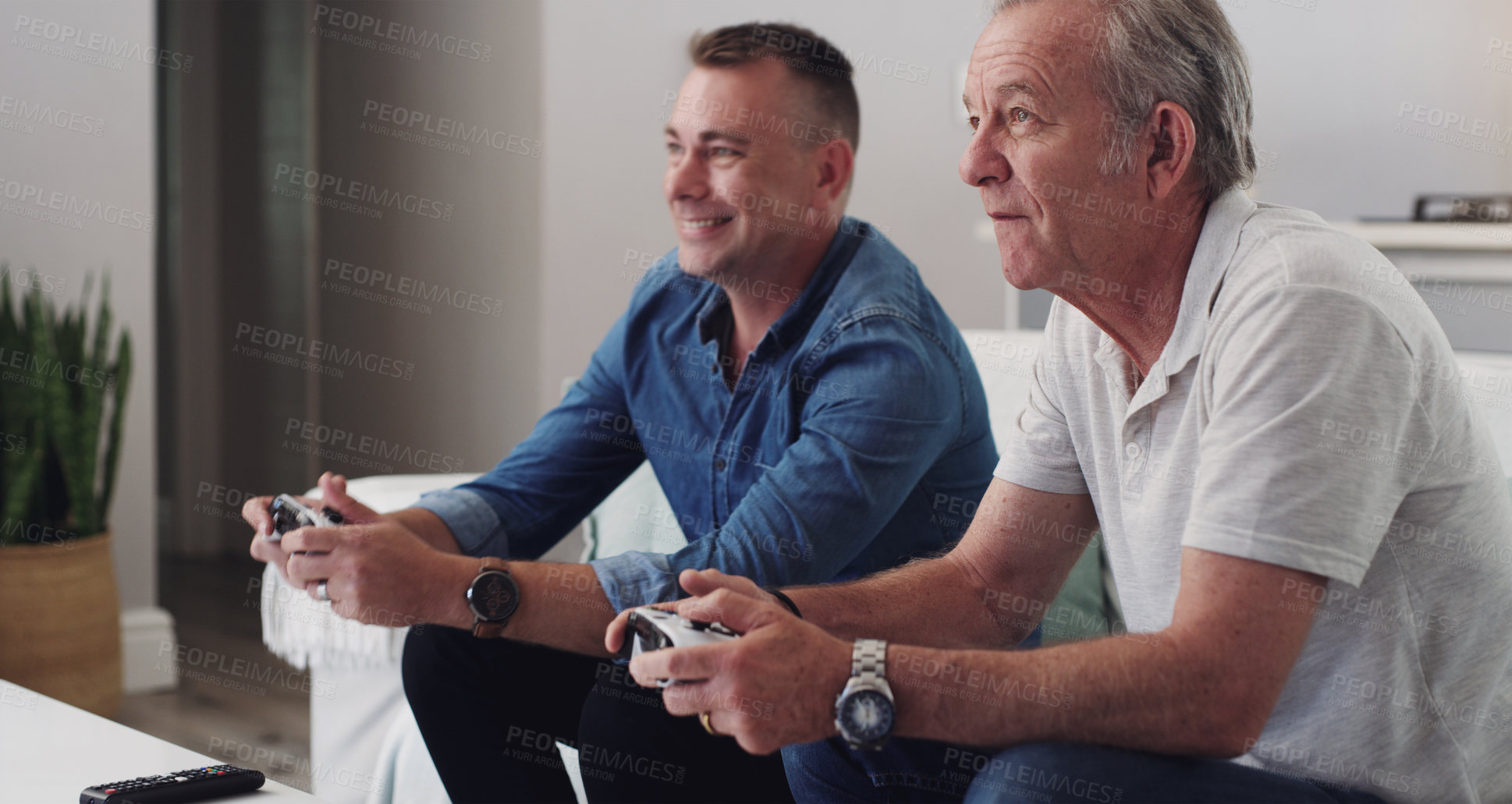 Buy stock photo Father, son and bonding with video games in home, controller and smile for gaming in lounge and sofa. House, family and men online with internet for fun with gamepad, weekend and together on couch