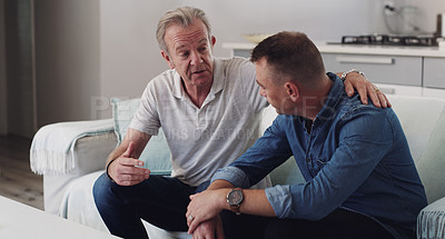 Buy stock photo Sofa, old man and adult son bonding together in living room, conversation and support in home. Love, relationship and senior dad with man on couch, relax and discussion, family connection and advice.