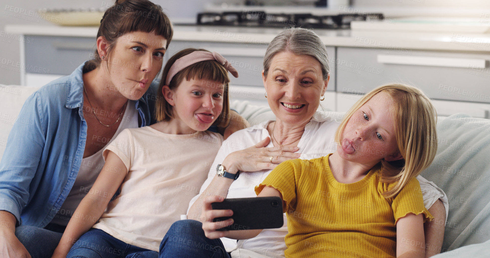 Buy stock photo Mom, grandmother and kids with selfie on sofa for love, funny face and memory of mothers day. Home, women and children with silly comedy in digital photography for bonding, social media and network