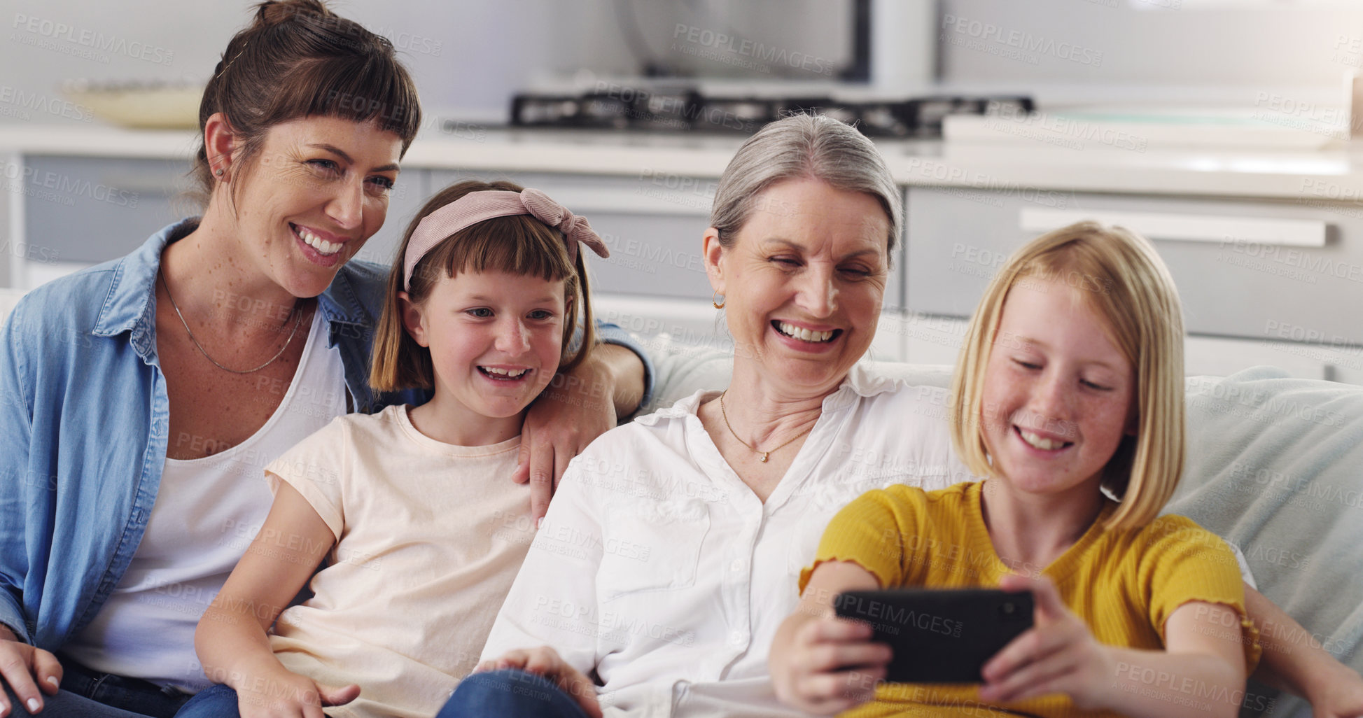 Buy stock photo Shot of a grandmother taking a selfie with her daughter and granddaughters