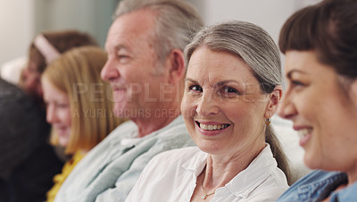 Buy stock photo Shot of a mature woman relaxing on the couch at home