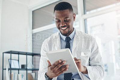 Buy stock photo Doctor, black man and happy with tablet online results of electronic health records, improved patient wellness and reading. Medical worker, digital technology and proud for progress and telehealth.