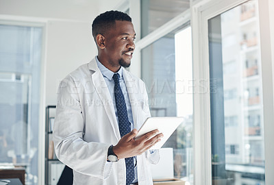 Buy stock photo Smile, doctor and black man with tablet, office and telehealth in clinic, web and online for healthcare. Workplace, hospital and internet for technology, medical and science for research of staff
