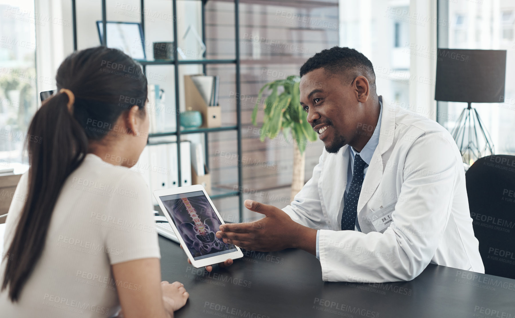 Buy stock photo X ray, patient and doctor with tablet in clinic for medical visit, health and wellness check. Woman, man and conversation in hospital with tech for scan, surgery advice or spine treatment research