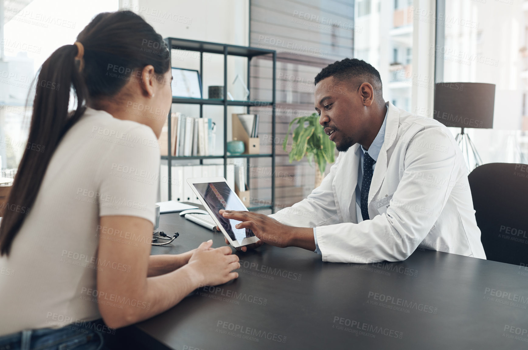 Buy stock photo X ray, patient and doctor with tablet in clinic for medical visit, healthcare or arthritis consultation. Woman spine, man and talk in hospital with tech for back pain and lumbar surgery research