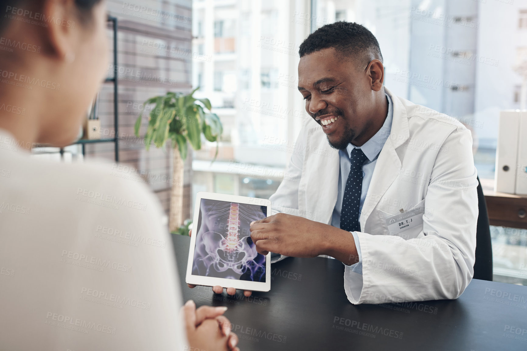 Buy stock photo X ray, patient and doctor with tablet in clinic for medical visit, health and wellness check. Woman, man and conversation in hospital with tech for scan, surgery advice or spine treatment agreement