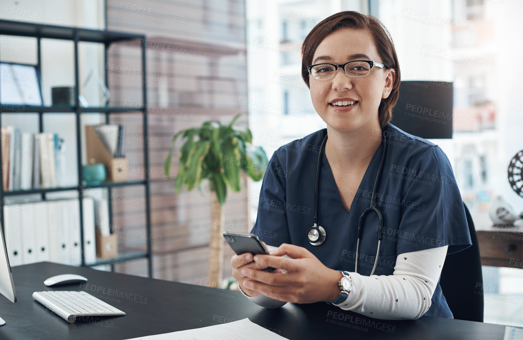 Buy stock photo Asian woman, portrait and doctor in office for medical services, advice and consulting in clinic. Happy female therapist, healthcare worker and consultant at desk in hospital for wellness management