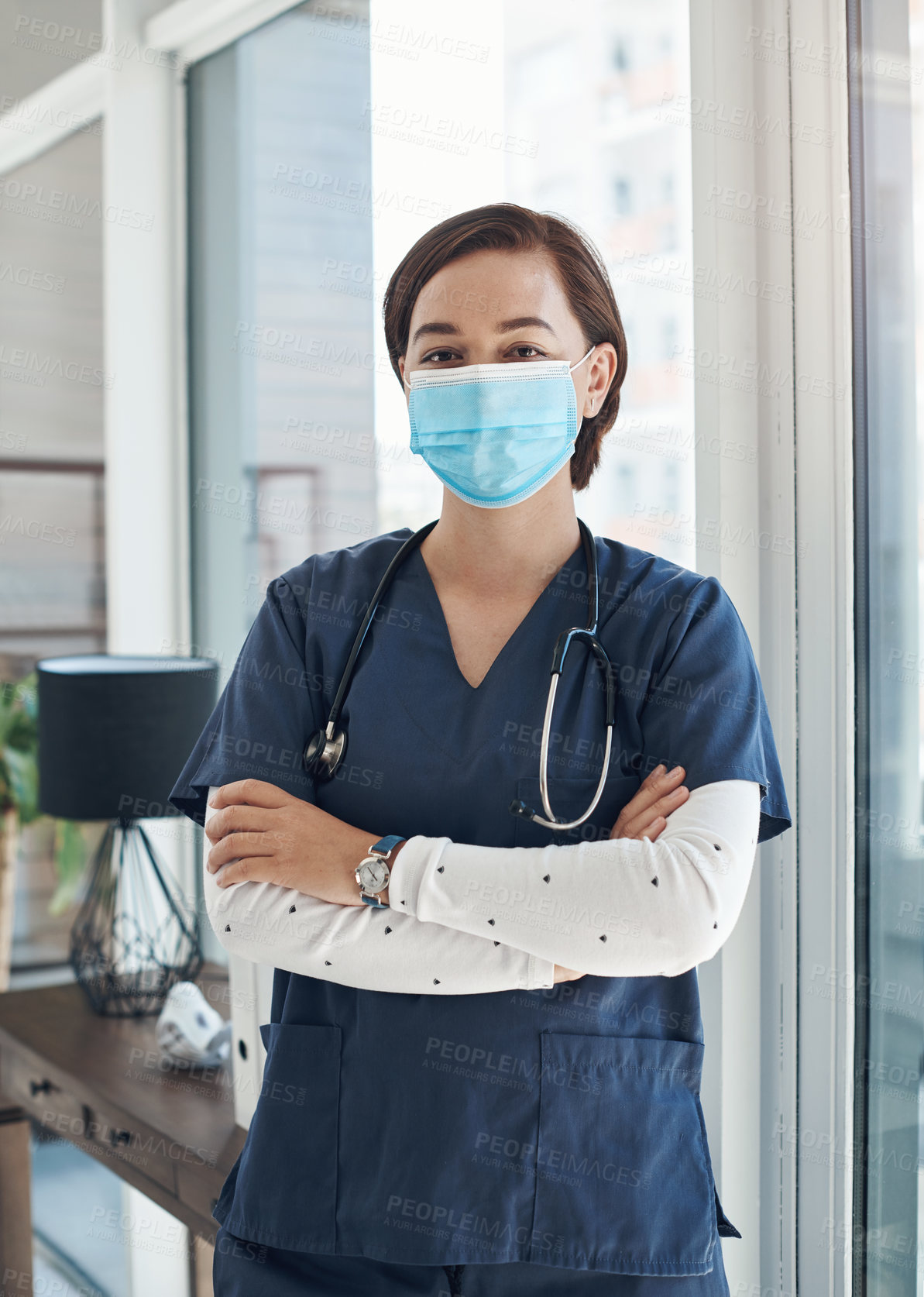 Buy stock photo Face cover, woman and doctor with arms crossed, medical and healthcare with career ambition in clinic. Person, protect or professional with portrait, proud or confidence with virus, safety or uniform