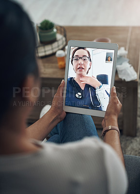 Buy stock photo Shot of an unrecognizable person on a videocall with a doctor