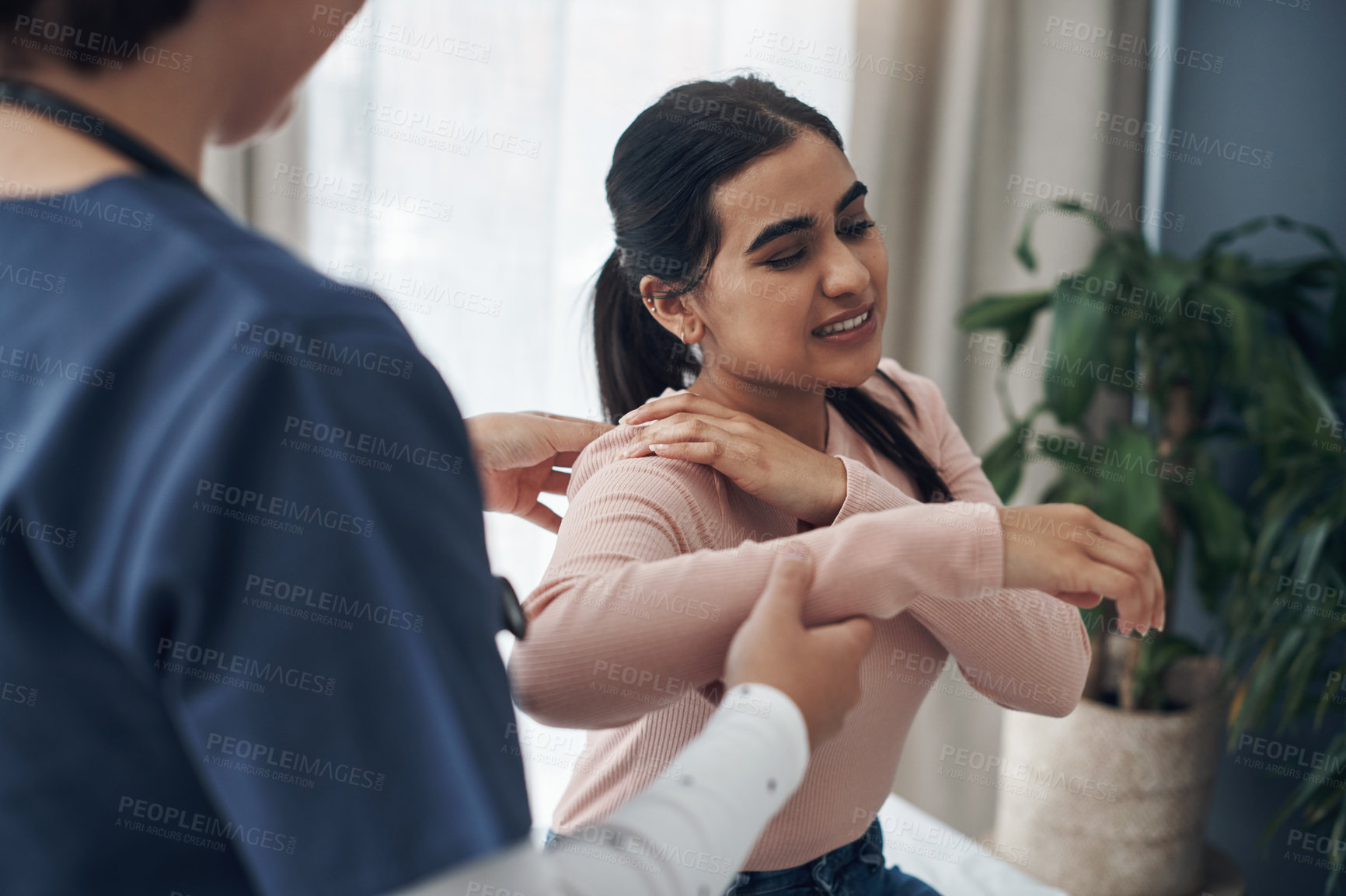 Buy stock photo Woman, doctor and appointment with shoulder pain, medical and patient conversation for health care concern. Clinic, muscle tension and talking with medic employee, injury and professional help