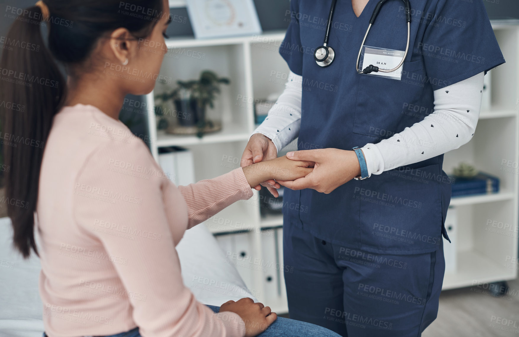 Buy stock photo Doctor, hands and young patient with checkup for arthritis, wrist pain or injury at hospital. Closeup of medical employee, nurse or cardiologist monitoring arm for beat, pulse or joint ache at clinic