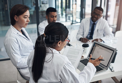 Buy stock photo Doctors, laptop and meeting for healthcare in office with teamwork, documents and research. Nurses, collaboration and group diversity in boardroom brainstorming strategy for telemedicine development