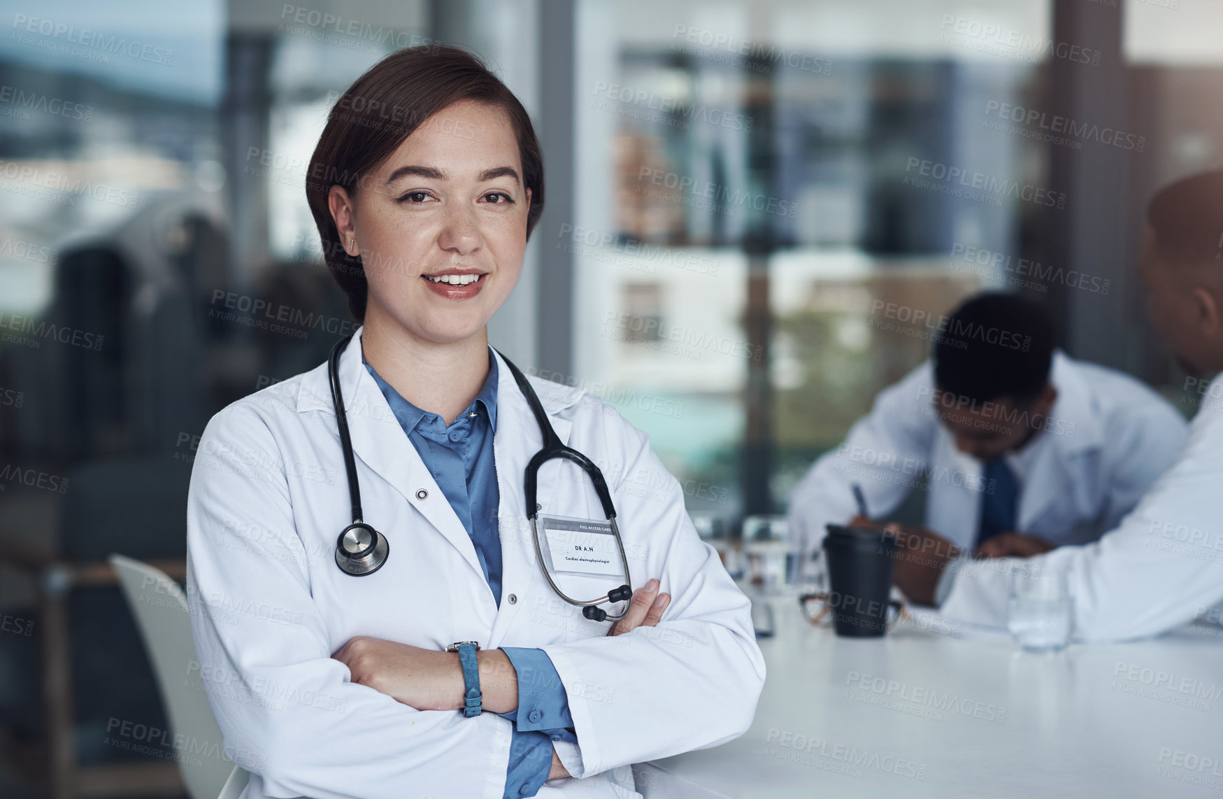 Buy stock photo Portrait, woman doctor and hospital for healthcare, physician and medical health staff. Professional, expert and surgeon with stethoscope, female person and cardiologist for research with colleagues