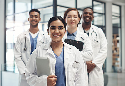 Buy stock photo Doctors, smile and portrait in hospital leader with clipboard for healthcare, wellness and solidarity. People, surgeons or physicians together for medical advice, teamwork and collaboration