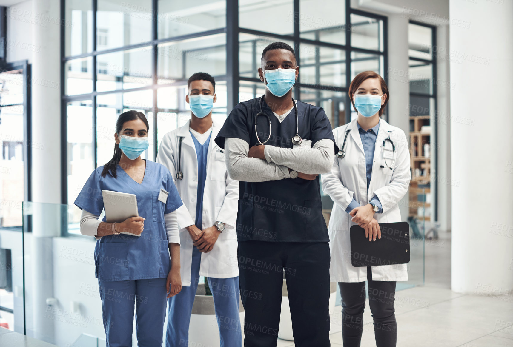 Buy stock photo Portrait, doctors and nurses in hospital as team for collaboration, healthcare and partnership for clinical trial or help. People, diversity and technology for online research or records and work.