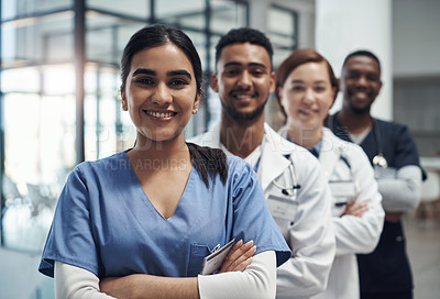 Buy stock photo Doctors, woman and arms crossed with smile, team or portrait for diversity in medical career at hospital. Surgeon group, people and men with collaboration, wellness and pride for healthcare services